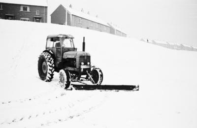 Snowplough clearing snow