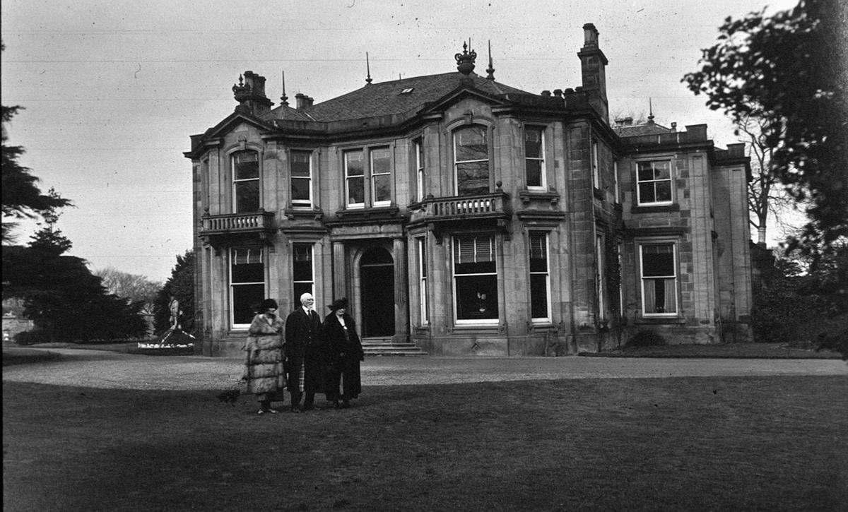 Dollar family outside Arnotdale House Falkirk Council